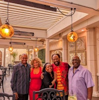 a group of people posing for a photo