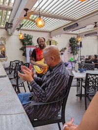 a group of people sitting at a table